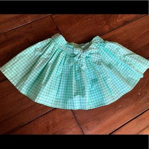 Carter’s toddler girl green gingham skirt.